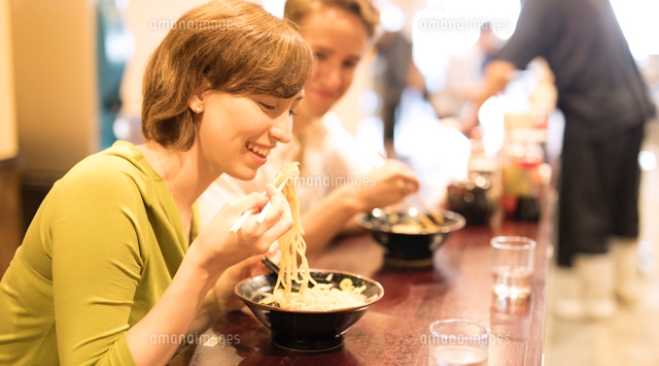 Woman eating ramen